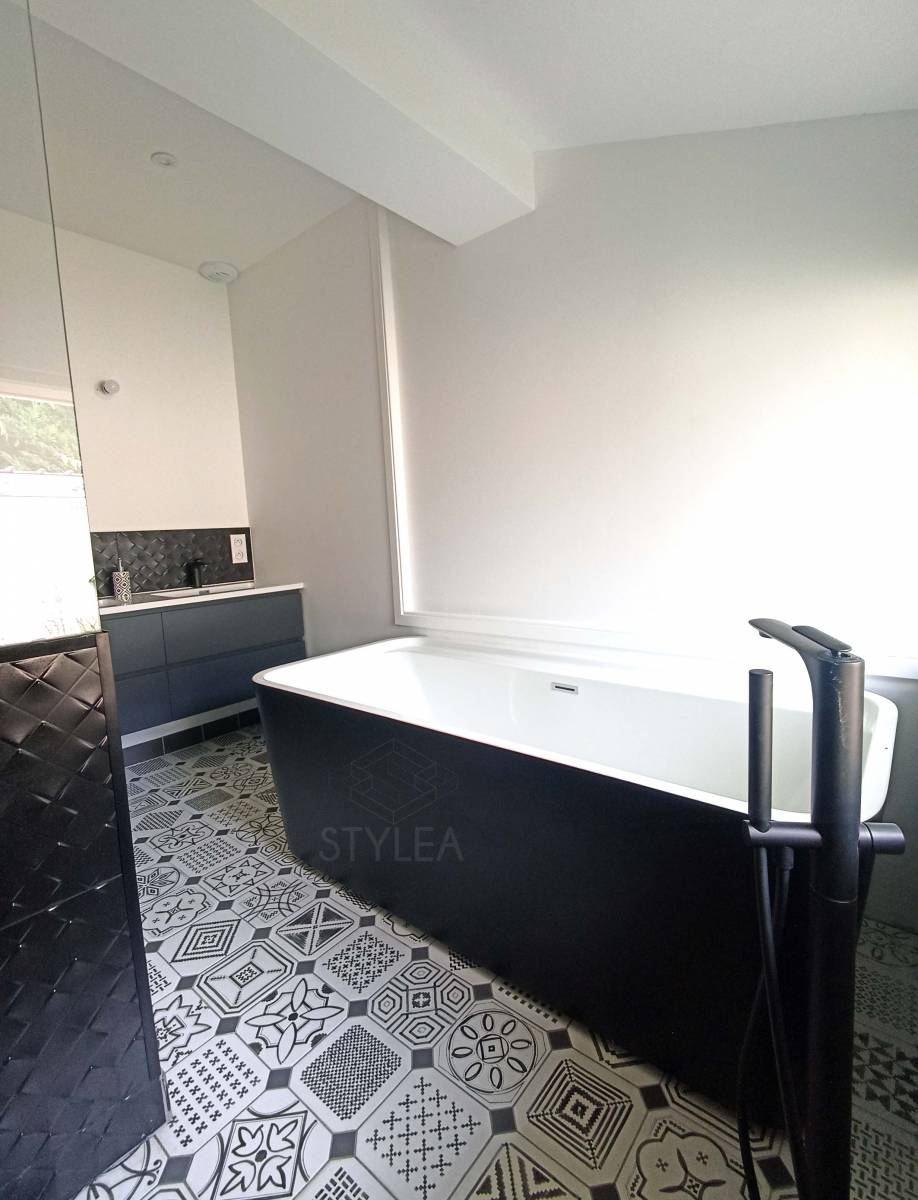 comment integrer une baignoire ilot dans ma salle de bain parentale à Salles en Gironde